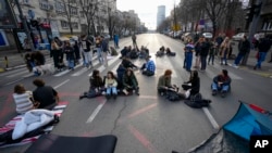 Serbian Students Launch 24-Hour Traffic Blockade In Election Protest