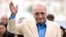 FILE - Director Martin Scorsese waves during a photo call for the film "Killers of the Flower Moon" at the Cannes Film Festival in Cannes, France, on May 21, 2023. Scorsese has backed a petition against the jailing of Iranian director Saeed Roustaee.