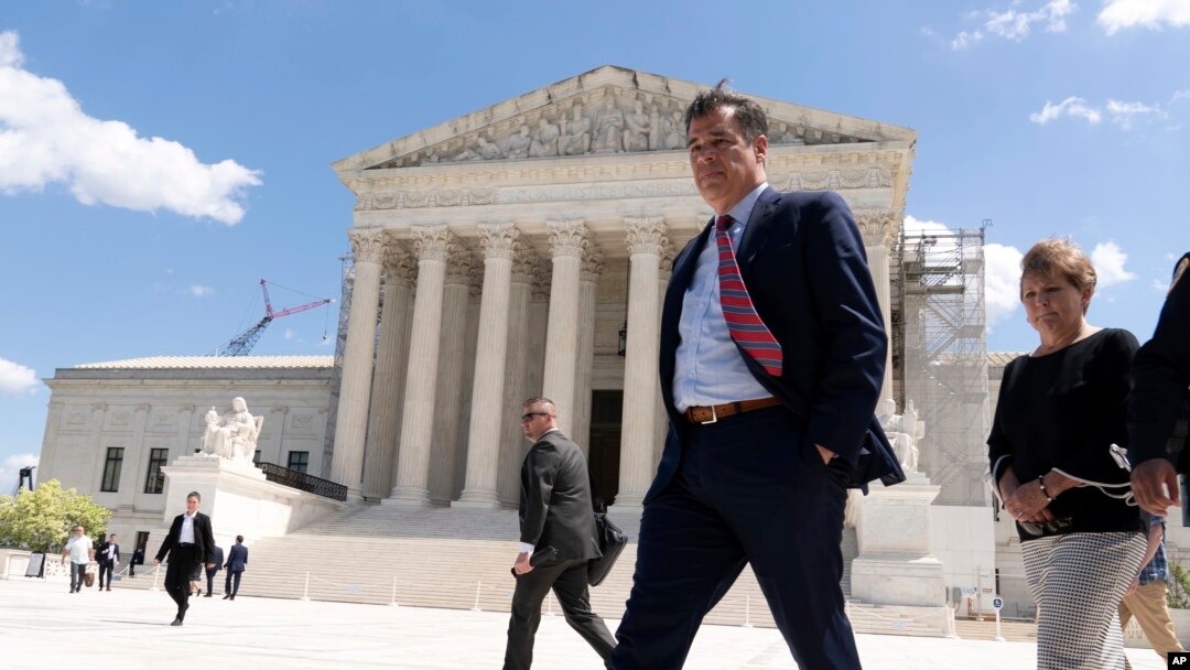 FILE - Idaho Attorney General Raúl Labrador leaves after talking to reporters outside the Supreme Court, April 24, 2024, in Washington.