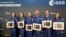 From left, Rosemary Cooga, Sophie Adenot, Raphael Liegeois, Pablo Alvarez Fernandez, Marco Sieber and Katherine Bennell-Pegg hold their certificates at the graduation ceremony at the European Astronaut Centre in Cologne, Germany, April 22, 2024.
