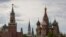 FILE - A general view on the Spasskaya tower of the Kremlin and St. Basil's Cathedral in Moscow, May 16, 2024. 
