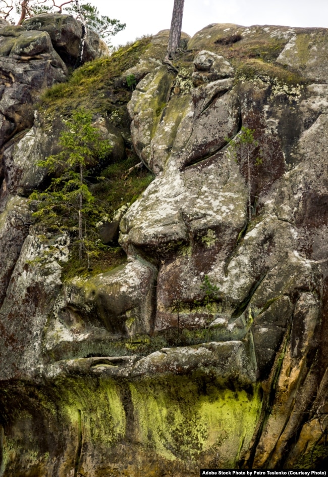 FILE - The artificial lion face in the rocks of Dovbush in the Ukrainian Carpathians. (Adobe Stock Photo)