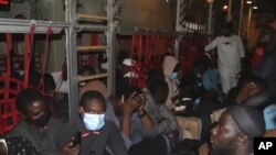 Nigerian Evacuees from Sudan who were stranded in the deserts at the border in Egypt onboard a Nigerian Airforce craft to Nigeria