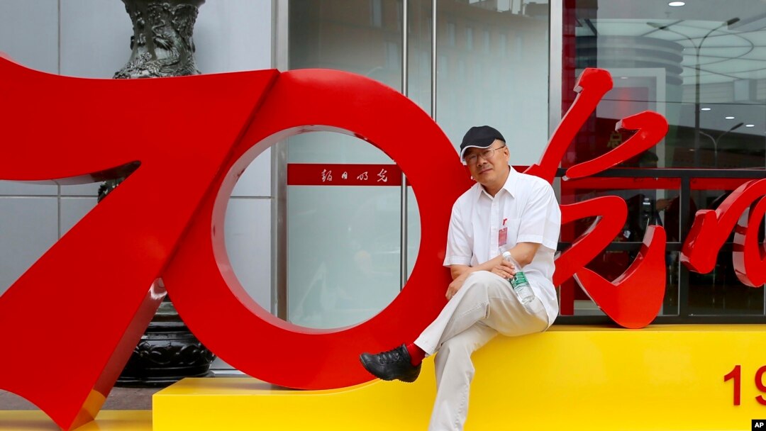 FILE - Veteran Chinese journalist Dong Yuyu is seen in Beijing in June 2019, in this photo provided by the Dong family.
