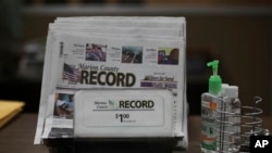 The last printed issue of the Marion County Record sits in a display in its office, Aug. 13, 2023. Editor and Publisher Eric Meyer says the newspaper will publish its regular weekly issue Aug. 16, 2023, despite a raid by local law enforcement officers.