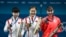 (Dari kiri) Peraih medali perak Sun Yingsha dari China, peraih medali emas Chen Meng dari China, dan peraih medali perunggu Hina Hayata dari Jepang di podium setelah perebutan medali emas tunggal tenis meja putri di South Paris Arena, Paris, 3 Agustus 2024. (WANG Zhao/AFP)