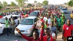 FILE - United Methodist Church members march, sing and dance in Jalingo, Nigeria, marking the 100th anniversary of Methodism in the country, in December 2023. Church leaders in Nigeria are considering leaving the church over theological differences.