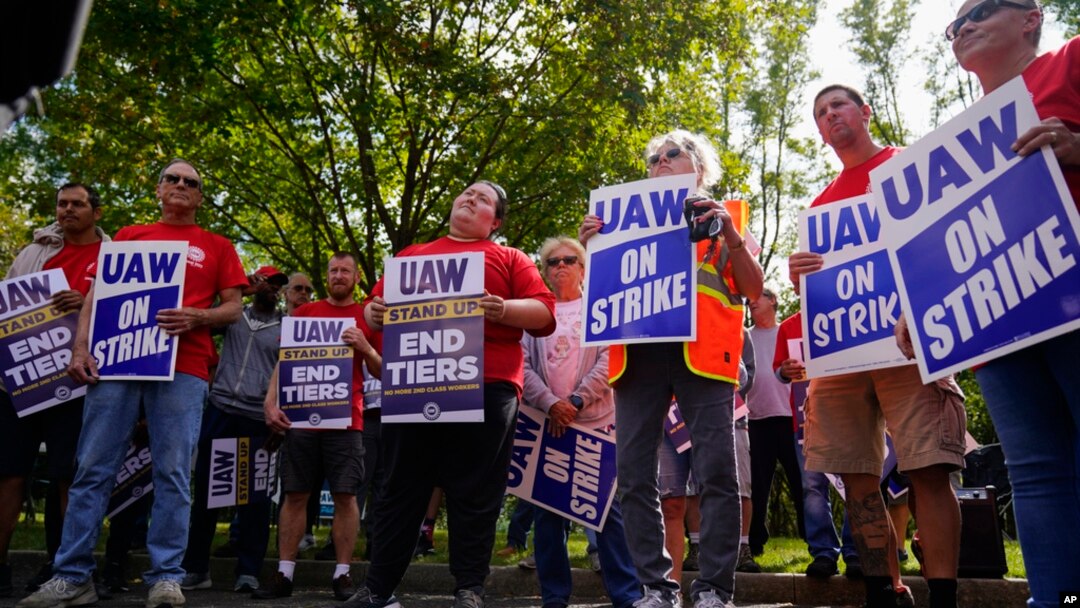 United Auto Workers members and supporters picket outside a General Motors facility in Langhorne, Pa., Sept. 22, 2023.