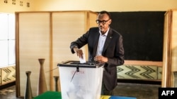 FILE - Incumbent Rwandan President Paul Kagame casts his vote in Kigali, on Aug. 4, 2017. Rwanda will hold presidential and parliamentary polls on July 15 next year, the election commission said on Dec. 12, 2023.