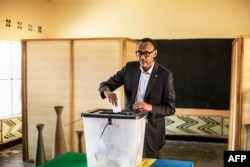 FILE - Incumbent Rwandan President Paul Kagame casts his vote in Kigali, on Aug. 4, 2017. Rwanda will hold presidential and parliamentary polls on July 15 next year, the election commission said on Dec. 12, 2023.