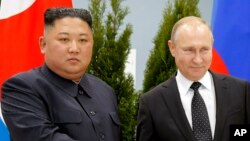 Arhiv - Kim Jong Un i Vladimir Putin 