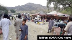 FILE - Afghans returning from Pakistan in this undated photo.