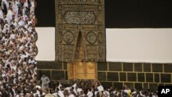 Muslim pilgrims circumambulate around the Kaaba, the cubic building originally built by the Archprophet Abraham, at the Grand Mosque, during the annual hajj pilgrimage in Mecca, Saudi Arabia, June 26, 2023.