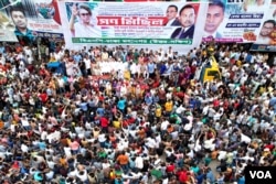 Supporters and activists of the opposition BNP and its allies at a political rally in Dhaka, July 12, 2023, demanding the resignation of PM Sheikh Hasina. (K. M. Nazmul Haque/VOA)