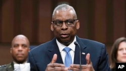 FILE - Secretary of Defense Lloyd Austin testifies on Capitol Hill, April 9, 2024. Austin spoke with China’s national defense minister on April 16, 2024, in an effort to improve communications with the Chinese military and reduce aggressive incidents in the Indo-Pacific.