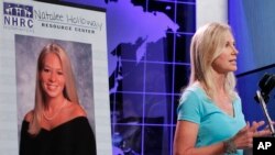 FILE - Beth Holloway, mother of Natalee Holloway, speaks during the opening of the Natalee Holloway Resource Center at the National Museum of Crime & Punishment in Washington, June 8, 2010.