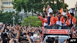 Move Forward Party leader and prime ministerial candidate Pita Limjaroenrat leads a victory parade with fellow party members and supporters outside Bangkok City Hall on May 15, 2023.