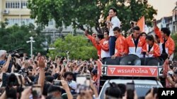 FILE - Move Forward Party leader and prime ministerial candidate Pita Limjaroenrat leads a victory parade with fellow party members and supporters outside Bangkok City Hall on May 15, 2023.