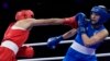 Algeria's Imane Khelif, left, fights Angela Carini of Italy in their women's 66-kilogram preliminary boxing match at the 2024 Summer Olympics on Aug. 1, 2024, in Paris, France. Khelif won after Carini abandoned the fight after 46 seconds.