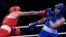 Algeria's Imane Khelif, left, fights Angela Carini of Italy in their women's 66-kilogram preliminary boxing match at the 2024 Summer Olympics on Aug. 1, 2024, in Paris, France. Khelif won after Carini abandoned the fight after 46 seconds.