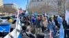 Somali American demonstrators gather during a rally outside the State Department in Washington, Feb. 24, 2023, to call attention to the clashes in a disputed town in Somalia’s breakaway Somaliland region.