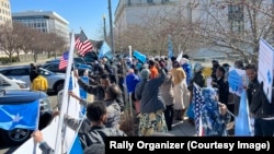 Somali American demonstrators gather during a rally outside the State Department in Washington, Feb. 24, 2023, to call attention to the clashes in a disputed town in Somalia’s breakaway Somaliland region.