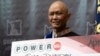 Cheng "Charlie" Saephan holds display check during a news conference where it was revealed that he was one of the winners of the $1.3 billion Powerball jackpot at the Oregon Lottery headquarters, April 29, 2024, in Salem, Ore. (AP Photo/Jenny Kane)