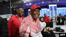 Economic Freedom Fighters (EFF) leader Julius Malema, right, reacts as he arrives for a press conference at the Independent Electoral Commission National Results Center at Gallagher Convention Centre in Midrand, South Africa, June 1, 2024.