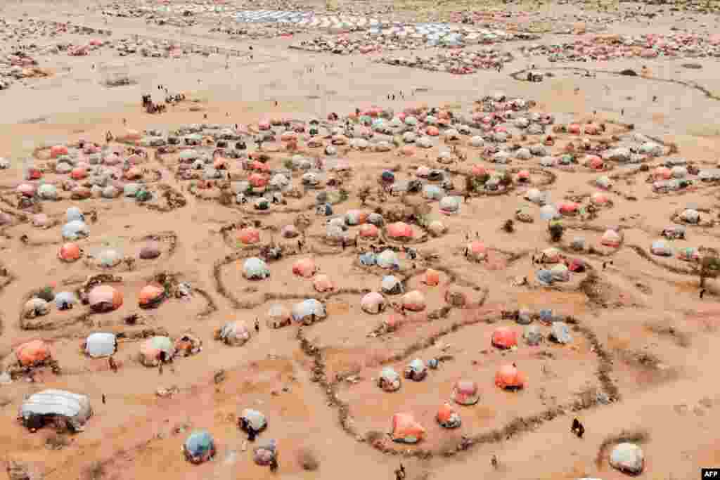 This aerial view shows makeshift structures of people displaced by drought at the Ladan internally displaced people (IDP) camp in Dolow, Somalia, May 1, 2023. 