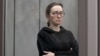 FILE — Alsu Kurmasheva, a journalist with Radio Free Europe/Radio Liberty who is in custody after she was accused of violating Russia’s law on foreign agents, attends a court hearing in Kazan, Russia, Feb. 1, 2024.