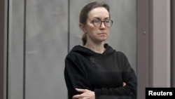 FILE - Russian-American journalist for Radio Free Europe/Radio Liberty (RFE/RL) Alsu Kurmasheva, who is in custody after she was accused of violating Russia's law on foreign agents, attends a court hearing in Kazan, Russia, Feb. 1, 2024.