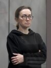 FILE - Alsu Kurmasheva, a journalist with Radio Free Europe/Radio Liberty who is in custody after she was accused of violating Russia's law on foreign agents, attends a court hearing in Kazan, Russia, Feb. 1, 2024.