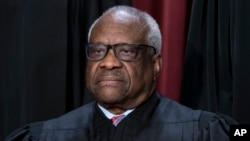FILE - Associate Justice Clarence Thomas at the Supreme Court building in Washington, Oct. 7, 2022. 