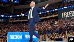 Democratic vice presidential candidate Minnesota Gov. Tim Walz arrives at the Fiserv Forum during a campaign rally in Milwaukee, Aug. 20, 2024. 