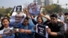 Supporters of Aam Admi Party, or Common Man's Party, shout slogans during a protest against the arrest of their party leader Arvind Kejriwal, in New Delhi, March 22, 2024.
