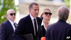 Hunter Biden arrives to federal court with his wife, Melissa Cohen Biden, June 10, 2024, in Wilmington, Delaware. 