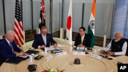 FILE - From left, U.S. President Joe Biden, Australian PM Anthony Albanese, Japanese PM Fumio Kishida and Indian PM Narendra Modi hold Quad talks at the G7 summit in Hiroshima, Japan, May 20, 2023. The four will meet again Saturday at Biden's Delaware home.