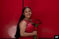 Perla Cano, 15, dressed in her “quinceñera” gown, poses for a souvenir photo at the annual “Mis XV” or “My Fifteenth” birthday celebration for patients at the Federico Gomez Children’s Hospital in Mexico City, Aug. 9, 2024.