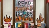 FILE - A Banned Books Week display is at the Mott Haven branch of the New York Public Library in the Bronx borough of New York City on Saturday, October 7, 2023. (AP Photo/Ted Shaffrey)