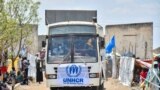 FILE: Civilians who fled Sudan's conflict arrive in a bus at the United Nations High Commissioner for Refugees (UNHCR) transit center in Renk, near the border crossing point in Renk County of Upper Nile State, South Sudan May 1, 2023.