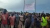 FILE - Internally Displaced Persons protesting the suspension of food distribution at the U.N. protection site, in Bentiu, Unity State, South Sudan, Sept. 6, 2023.