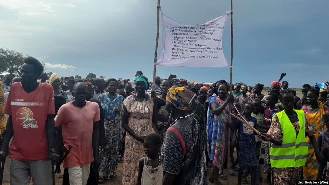 FILE - Internally Displaced Persons protesting the suspension of food distribution at the U.N. protection site, in Bentiu, Unity State, South Sudan, Sept. 6, 2023.