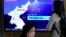 FILE - A TV screen displayed at the Seoul Railway Station in Seoul, South Korea, shows a news program reporting on North Korea's missile launch Feb. 24, 2023.