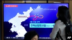 A TV screen displayed at the Seoul Railway Station in Seoul, South Korea, shows a news program reporting on North Korea's missile launch Feb. 24, 2023.