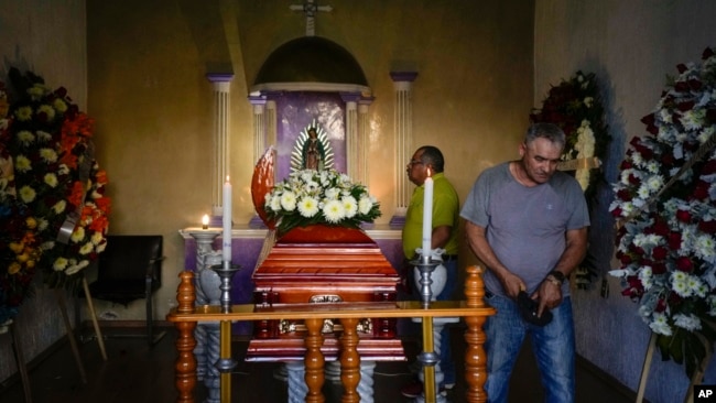 Mourners attended the wake of mayoral candidate Armando Perez in Maravatio, Michoacan state, Mexico, Feb. 27, 2024.