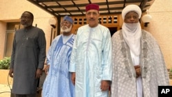 From left; ECOWAS Commission President Mousa Tourey, ECOWAS Special Envoy to Republic of Niger General Abdulsalami Abubakar, ousted Niger President Mohamed Bazoum, and Sultan of Sokoto Alhaji Muhammad Saad Abubakar III, in Niamey, Niger, Aug. 19, 2023.
