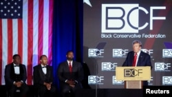 FILE - Republican presidential candidate and former U.S. President Donald Trump delivers a keynote speech at the Black Conservative Federation gala dinner, in Columbia, South Carolina, Feb. 23, 2024.