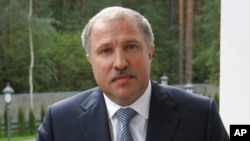 FILE - Russian businessman Eduard Khudainatov is seen outside Moscow, Sept. 4, 2010. (Presidential Press Service)