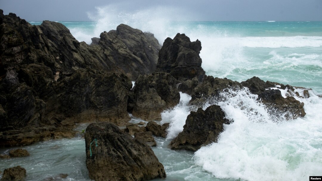 Waves crash against the South Shore as winds from Hurricane Ernesto approach Church Bay, Bermuda, Aug. 16, 2024. 