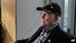 FILE - World War II veteran Hilbert Margol sits during an interview with the Associated Press in Atlanta, Georgia, March 14, 2024. Margol will be feted in France among 60 American veterans traveling to Normandy to mark 80 years since the D-Day landings.